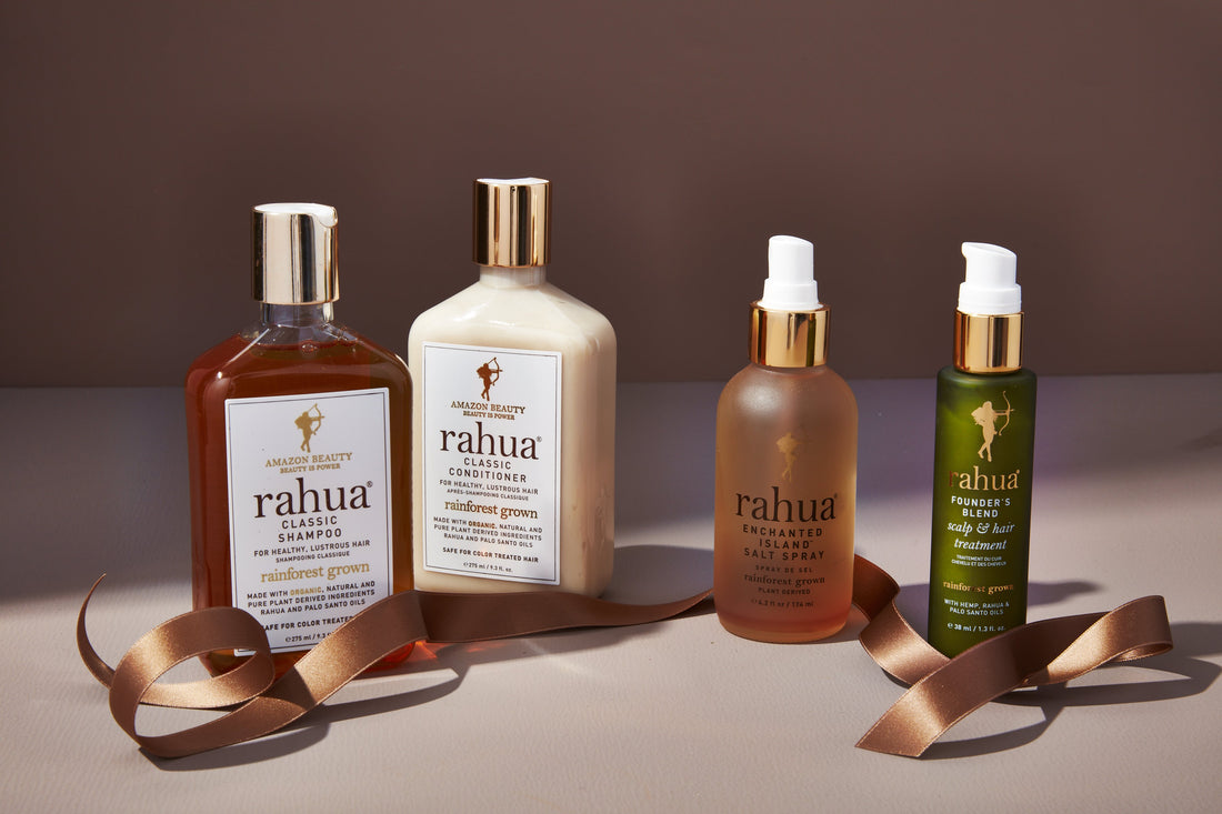 Rahua scalp and hair care products on the table with brown ribbon