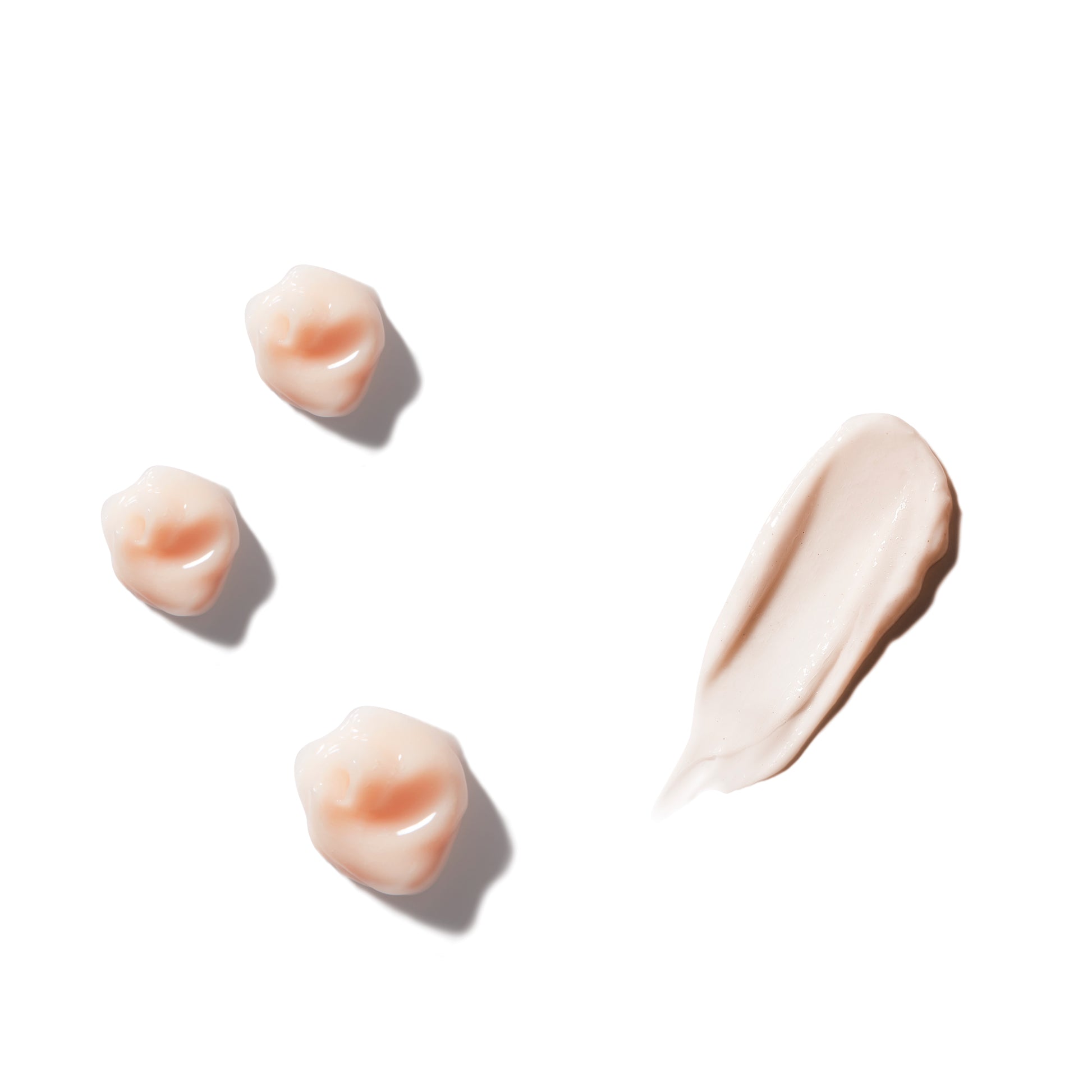 texture shot of three dollops of rahua hydration shampoo with a swipe of rahua hydration conditioner on a plain white background|variant:2-oz