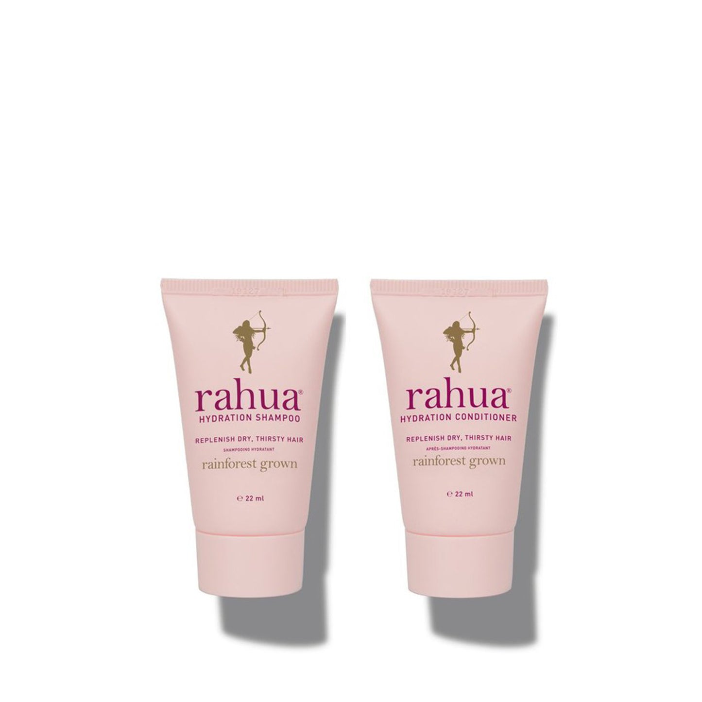 two pink bottles of rahua hydration shampoo and conditioner on a plain white background|variant:074-oz