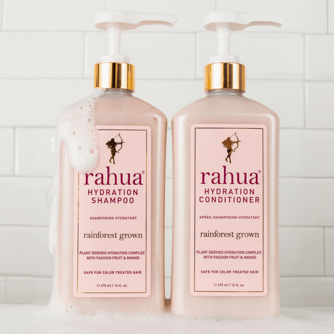 gif of rahua hydration shampoo and hydration conditioner with foamy soap bottles running down the side of the bottle|variant:16-oz